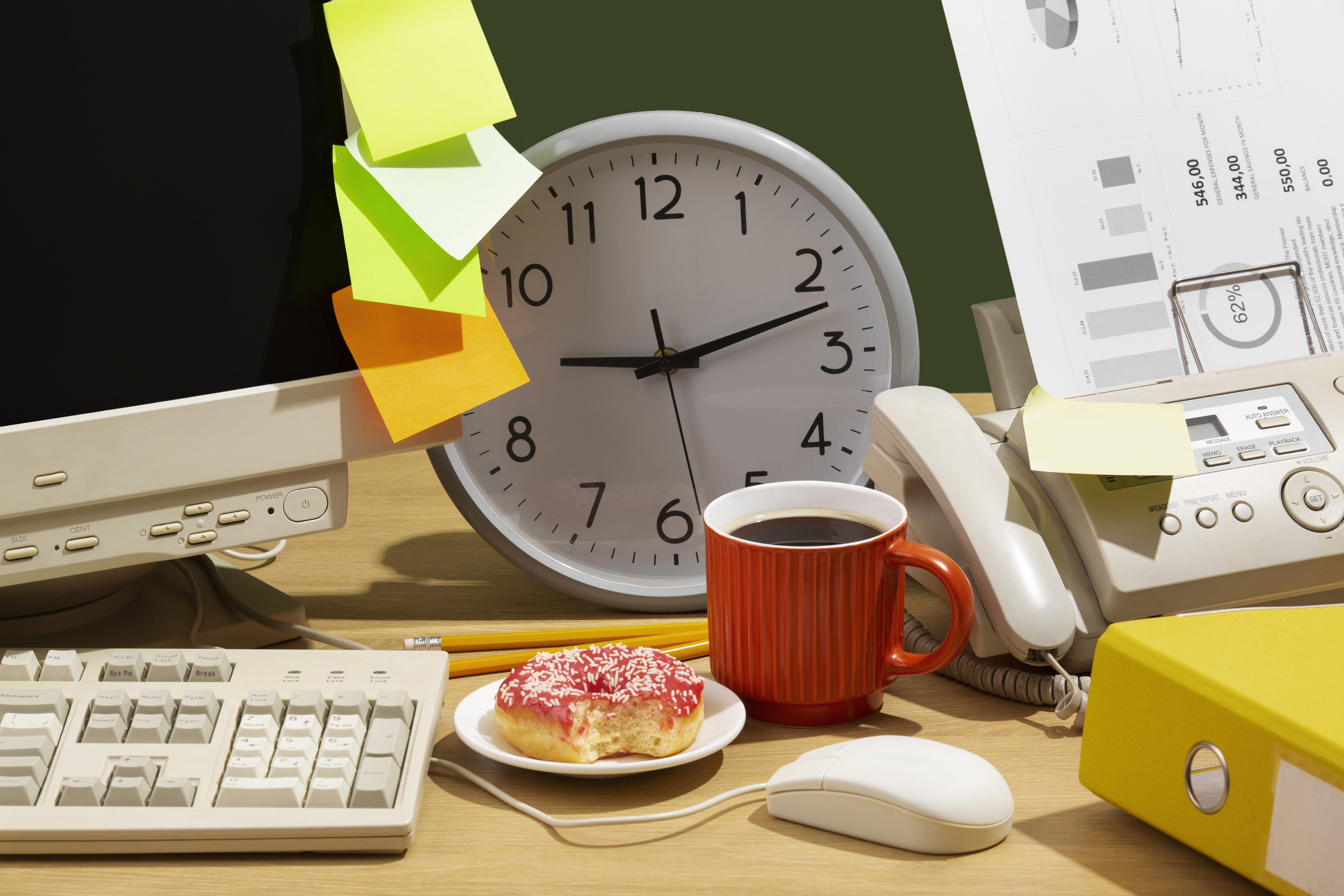 messy-office-desk-with-old-computer-still-life